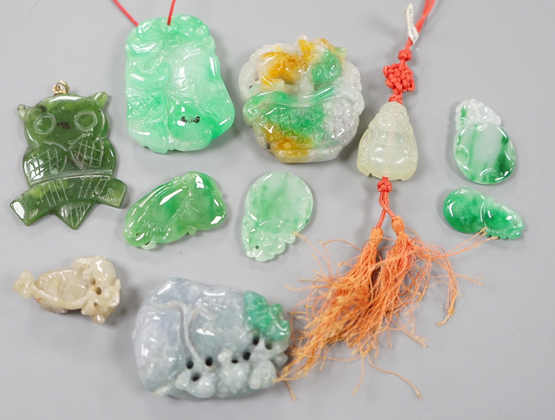 A group of ten jadeite and hardstone carvings and pendants